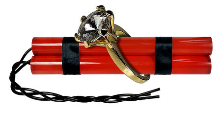 Red dynamite with long braided wicks with diamond ring to show a volatile relationship