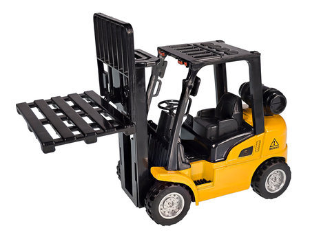 A yellow forklift for moving large objects with lift up and facing leftの写真素材