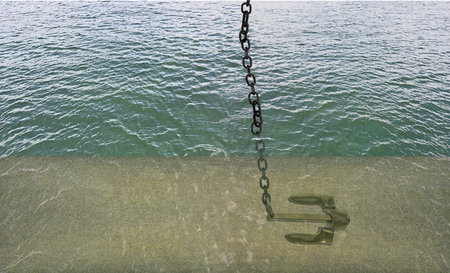 Boat anchor under water to show the importance of remaining anchored in place