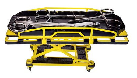 Medical Gurney for Transporting Patients with several medical scissorsの写真素材