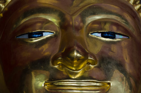 Buddha gold statue face close-upの写真素材