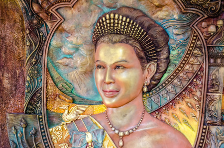 BANGKOK ,THAILAND - 9 JULY 2014 : masterpiece of traditional Thai  style sculpture on the wall of church of Wat Rama 9 Kanchana Pisek ,Portrait of Thai Queen Sirikit ,   Bangkok Thailandのeditorial素材