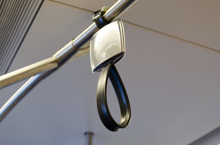 Handles for hold and standing passenger inside sky trainの写真素材