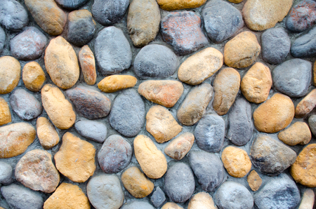 dacorative clolrful stone  wall backgroundの写真素材