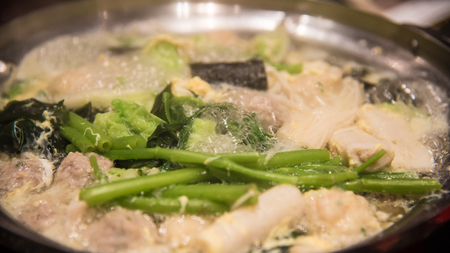 Sukiyaki on hot boil water in the pot for lunchの写真素材