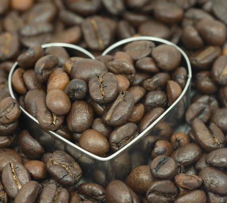 coffee beans on in heart shape boxの写真素材