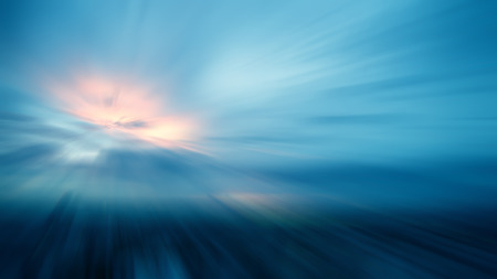 Radial blur from sunset  with blue light  sky in city backgroundの写真素材