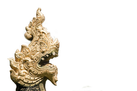 Naka serpent king statue isolated on white backgroundの写真素材