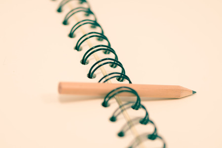 Pencil on middle of binding empty note vintage toneの写真素材