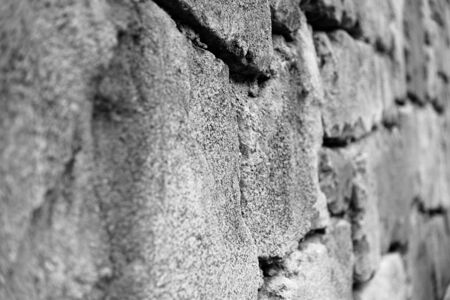 Rock wall on side view vintage background black and whiteの写真素材