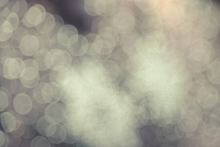 Defocused blur bokeh of decoration light at night abstract background