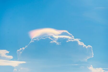 Big rain bow cloud on sunny day rare phenomenon