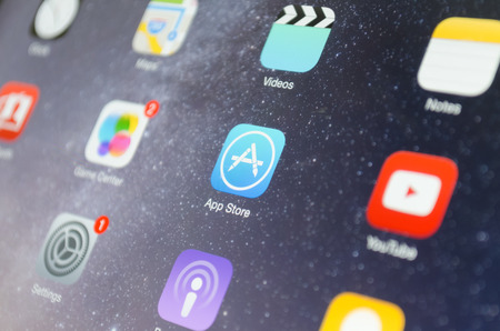Bangkok, Thailand - June 17, 2015  : A close-up photo of Apple iPad mini 2 start screen focused on...