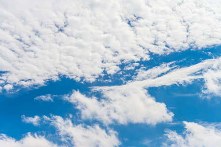 Beautiful clouds in the dark blue sky on sunny day