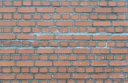 Orange old brick wall background