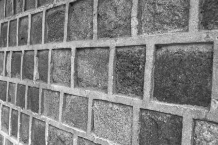Block concrete wall closeup in view side background black and whiteの写真素材