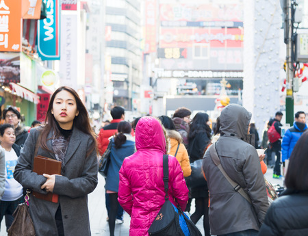 Seoul, Republic of Korea - December 31, 2014 : Unknown People walking around Myeongdong ,famous shopping street in Seoul capital of South Koreaのeditorial素材