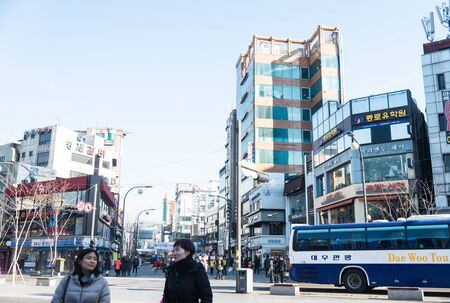 Seoul , South Korea - January 3, 2015 : People cross street at urban area in Seoul ,South Koreaのeditorial素材