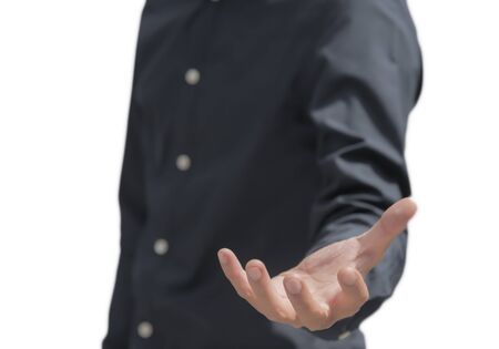 Business Asian male in black shirt holding something with hand  focused on the hand isolated on...