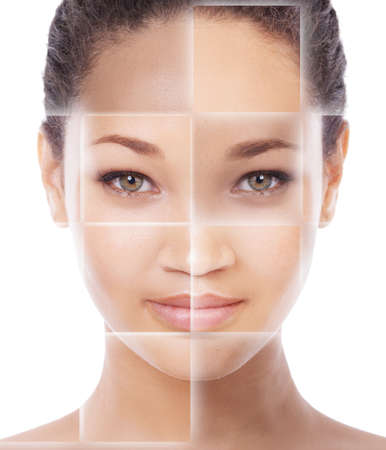 Beauty squared. Closeup concept portrait of a beautiful young woman with a grid pattern layered over her face.の写真素材