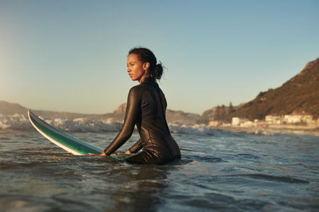 Looking for the next wave to conquerの写真素材