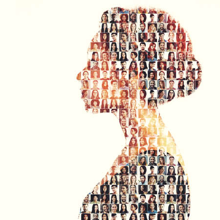 Faces from within. Composite image of a diverse group of people superimposed on a womans profile.の写真素材