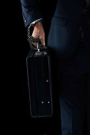 Getting the precious cargo there safely. Shot of an unrecognizable businessman with a briefcase...