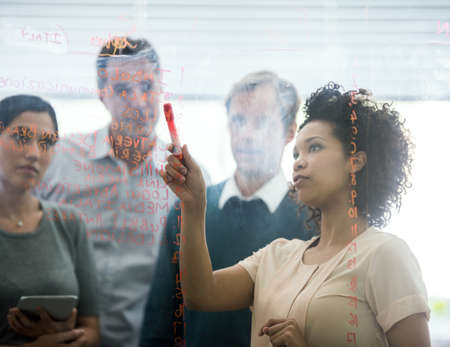 Real life businesspeople shot on location. Since these locations are the real thing, and not shot in an "office studio", high ISO levels are sometimes needed to catch the moment. The ISO range is between 250-600 so it should be fine for most usage cases. Most people won't notice anything really, but if you are a nerd like us, you can see a little noise.の写真素材