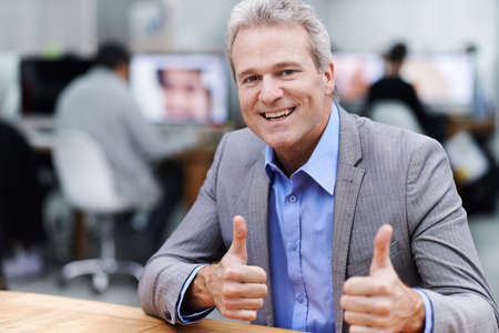 Your amazing work deserves two thumbs upの写真素材