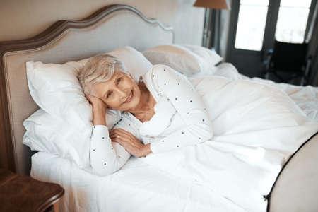 Everybody loves the comfort of their bedの写真素材