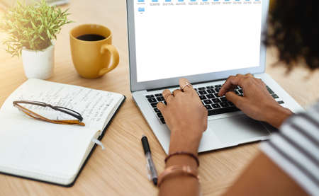 Shes an internet explorer. Shot of an unrecognizable woman working from home.