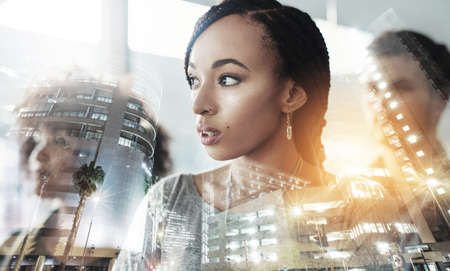 Building their business on ambition and drive. Multiple exposure shot of businesspeople superimposed...