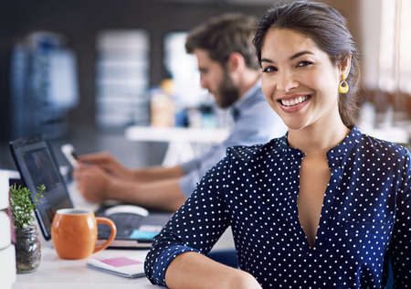 What can I do for you today. Cropped shot of a creative businessperson working in the office.