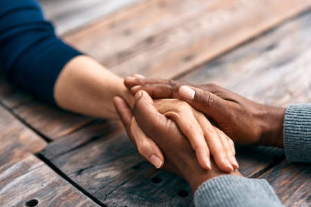 I find comfort in being with you. Cropped shot of two unrecognizable people holding hands.の写真素材