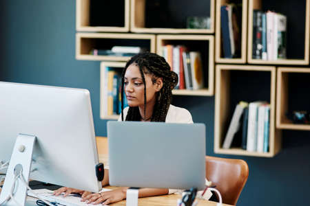 Her success depends on how much work she puts in. Cropped shot of an attractive young woman working...