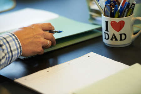 He takes pride in his workspace. Cropped image of a businessman sitting at his office desk with...