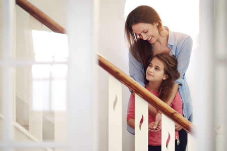 Home is wherever were together. Shot of a happy young mother and daughter enjoying their time...