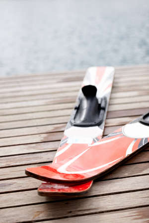 A pair of skis. Cropped view of a pair of skis alongside the lake.の写真素材