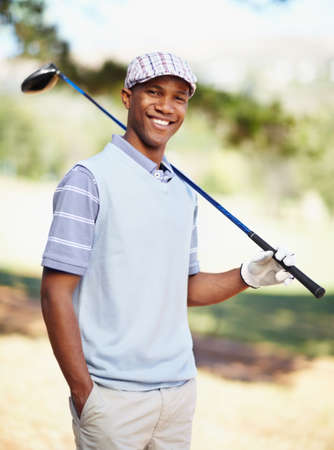 Ive been waiting all week to get on the course. Portrait of a confident african american golf player holding a driver.の写真素材