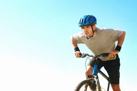 Cyclist in training. Cropped shot of a handsome young cyclist outdoors.