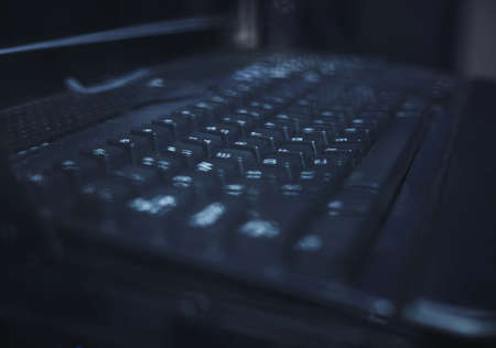 Typo for your thoughts. Closeup shot of a keyboard in a server room.