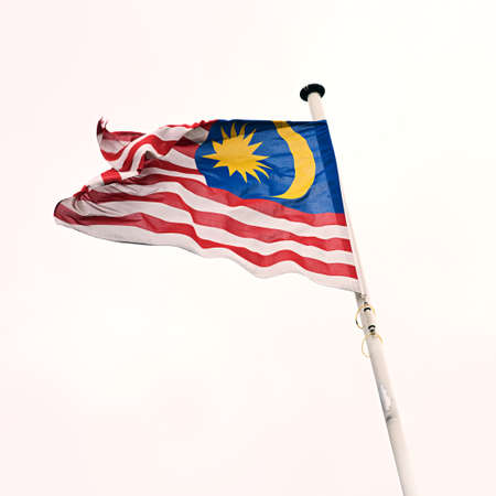 The flag of Malaysia. Shot of the Malaysian flag blowing in the wind.の写真素材