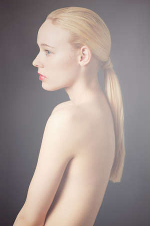 Classic perfection. Beauty profile of a young woman.の写真素材