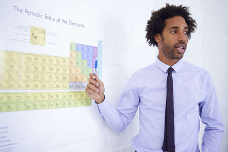 This science teacher knows what hes talking about. Shot of a male science teacher explaining the...