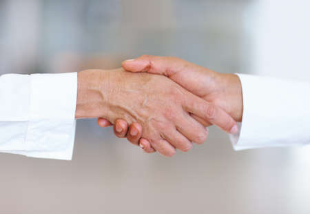 Deal. Closeup of handshake between business men.