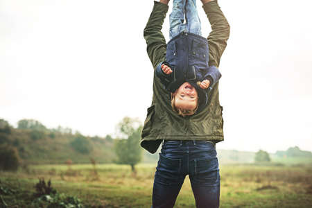 Childhood is fun from every angle. Cropped shot of a father bonding with his son outside.