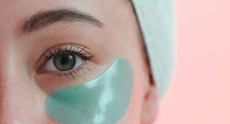 Puffy eyes are a thing of the past. Cropped studio portrait of a young woman with an eye treatment...