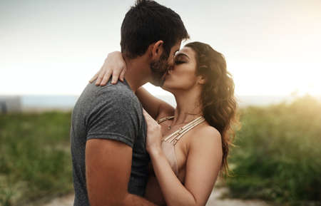 Choose love. Always. Shot of a young couple spending a romantic day at the beach.