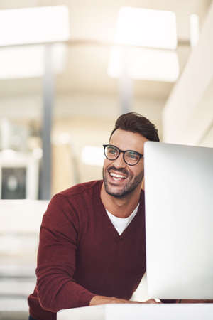I like where this is going. Shot of a young businessman in the office.