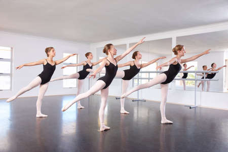legs. Young girls in ballet class.